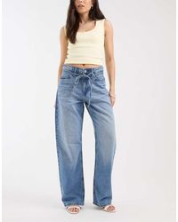 River Island - Tie Detail Waist Wide Leg Jeans - Lyst