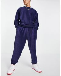 ASOS – super-oversize-jogginghose aus geripptem velours - Blau