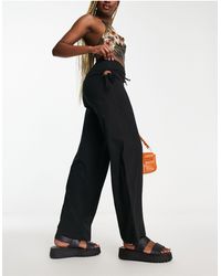 ONLY - Neon & Nylon Low Waisted Trousers With Cut Out Detail - Lyst