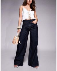 River Island - Vaqueros De Pernera Ancha Holgada Con Lavado Oscuro De -Azul Marino - Lyst