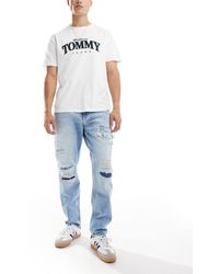 Tommy Hilfiger - Isaac - jeans affusolati lavaggio chiaro effetto invecchiato - Lyst