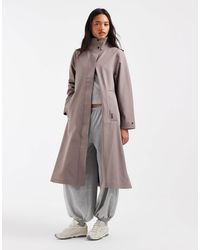 Rains - Suva veste à capuche trapèze softshell imperméable beige - Lyst