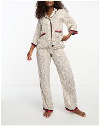 DKNY - – pyjama aus em satin mit print und kragen mit einkerbung - Lyst