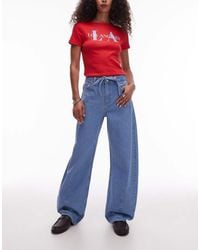 TOPSHOP - Jeans Met Wijde Ronde Pijpen En Hoge Taille Met Strikceintuur - Lyst