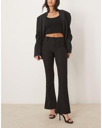 Gina Tricot - Low Rise Flare Leg Stretch Trousers - Lyst
