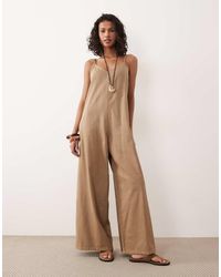 ASOS - Zachte Denim Jumpsuit Met Wijde Pijpen - Lyst