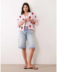 open lace back dress Hoodie Dress: Thrilling Playboy Women's Repeat Print Design