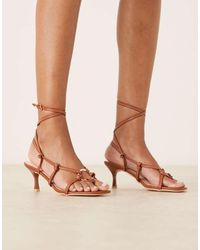 Raid - Sandalias Doradas De Tacón Con Diseño Anudado A La Pierna Y Detalle De Metal Danika De -Marrón - Lyst