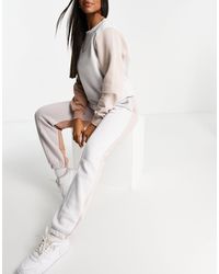Joggers colour block pastello oversize con piccolo logo metallizzatoNike in  Denim | Lyst