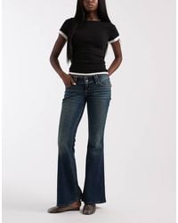 Hollister - Low Rise Bootcut Jeans - Lyst