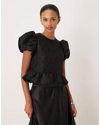 Sister Jane - Screenplay Jacquard Puff Sleeve Ruffle Hem Open Back Contrast Bow Top - Lyst