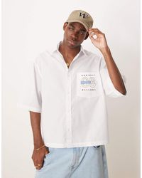 ASOS - Oversized Poplin Overhemd Met Rechte Pasvorm En Geborduurd Logo Op De Borst - Lyst