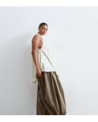 ARRANGE - Curve Waist Seam Balloon Leg Trousers - Lyst