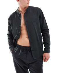 Pull&Bear - Camicia a maniche lunghe effetto lino nera con scollo serafino - Lyst