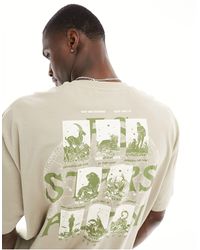 ASOS - T-shirt oversize avec imprimé signes du zodiaque au dos - beige - Lyst