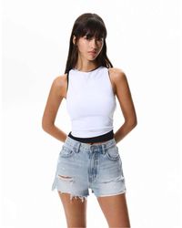 Pull&Bear - Denim Short Met Gerafelde Zoom - Lyst