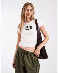 Levi's - Baby Ringer T-Shirt Met Grafische Print - Lyst