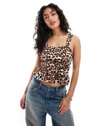 Vero Moda - – easy – gesmoktes, ärmelloses oberteil mit leopardenmuster - Lyst