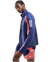 adidas Originals - Adidas running - own the run - veste - marine et orange - Lyst