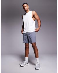 4505 - Icon 7 Inch Quick Dry Training Shorts With Zip Pockets - Lyst