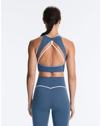 Oysho - Top Senza Maniche Compressivo Color Block - Lyst