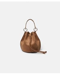 Stradivarius - Borsa A Secchiello Rigida Color Caramello Con Occhielli - Lyst