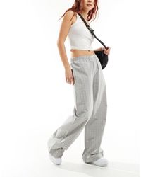 Weekday - Pantalones a cuadros holgados hanna - Lyst