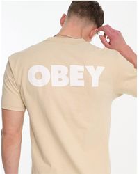 Obey - T-shirt avec imprimé logo large dans le dos - beige - Lyst