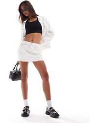 Tommy Hilfiger - Sophie Low Waist Micro Mini Skirt - Lyst