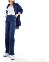 Lee Jeans - Lee - stella - jeans svasati a vita alta blu medio - Lyst