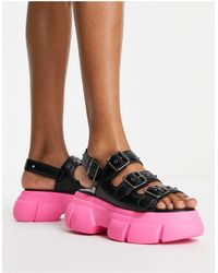 Koi Footwear - Koi - sticky secrets - sandali neri con suola spessa rosa - Lyst