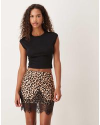Never Fully Dressed - Satin Mini Skirt With Lace Trim Hem - Lyst