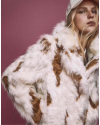 Stradivarius - Veste en fausse fourrure contrastante - écru - Lyst