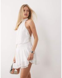 Fashionkilla - Chiffon Halterneck Foldover Detail Ruffle Skirt Mini Dress - Lyst