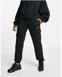 Pantalones cargo Nike de mujer desde 50 €