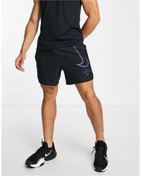 Nike - Run division challenger dri-fit swoosh - pantaloncini neri con logo da 5" - Lyst