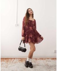 Reclaimed (vintage) - Luchtige Mini Jurk Met Lange Mouwen, Gestrikte Voorkant En Bloemenprint - Lyst