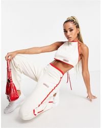 adidas Originals - Resort - pantalon large avec liserés rouges - cassé - Lyst