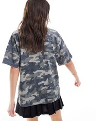 ASOS - – oversize-t-shirt mit grafik und verwaschenem military-muster - Lyst