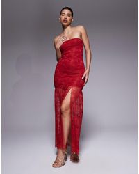 Kaiia - – exclusive – doppellagiges, figurbetontes, trägerloses maxikleid aus er spitze mit transparentem saum - Lyst