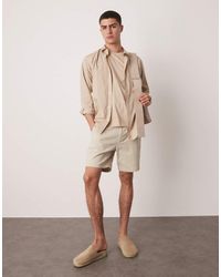 ASOS - Pantalones Cortos Chinos De Corte Pitillo Y Largo Medio De -Neutro - Lyst