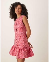 Ghospell - Robe courte en jacquard avec ourlet à volants - rouge et rose - Lyst