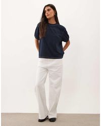 GOOD AMERICAN - T-Shirt Met Korte Mouwen En Contrasterende Stiksels - Lyst