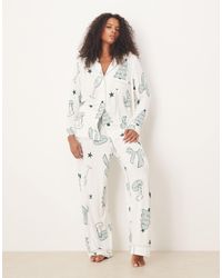 ASOS - Asos design curve - pyjama ultra doux avec pantalon et chemise à manches longues et liserés contrastants avec imprimé boissons - Lyst