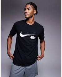 Nike - Dri-fit - t-shirt à logo virgule - Lyst