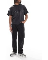 Hollister - Vaqueros Negros Holgados Con 5 Bolsillos De - Lyst