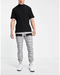 Pantalones es con diseño a cuadros y rayas laterales Bershka de Denim de  color Gris para hombre | Lyst