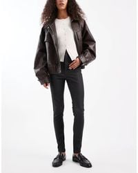 New Look - Coated Skinny Jeans - Lyst
