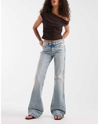 Tommy Hilfiger - Sia Low Rise Bootcut Jeans - Lyst