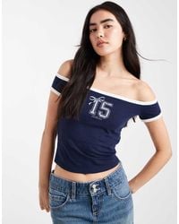 Hollister - Short Sleeve Off The Shoulder Graphic T-shirt - Lyst